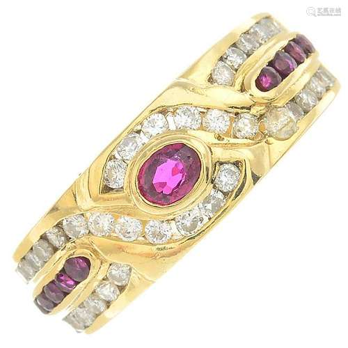 A dress ring, set with rubies and diamonds.Ruby total