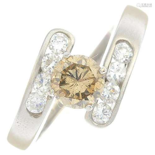 An 18ct gold diamond crossover ring. Principal diamond