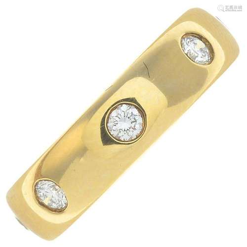 An 18ct gold diamond band ring. Estimated total diamond