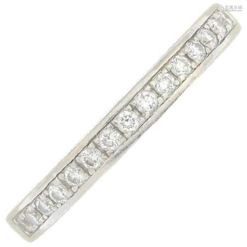 A platinum diamond half eternity ring.Estimated total