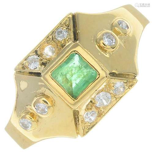 An emerald and diamond cluster ring.Estimated total