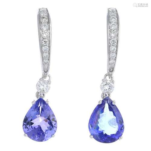 A pair of tanzanite and diamond drop earrings.