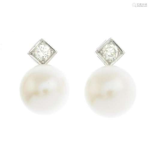 A pair of cultured pearl and diamond earrings.Estimated