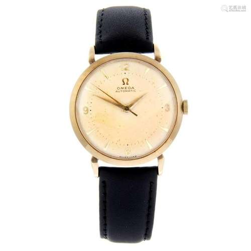 OMEGA - a gentleman's wrist watch. 9ct yellow gold