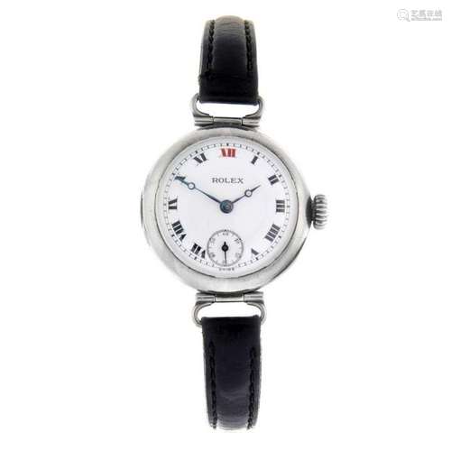 ROLEX - a trench style wrist watch. White metal case,