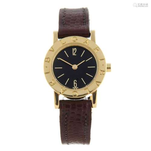 BULGARI - a lady's wrist watch. 18ct yellow gold case.