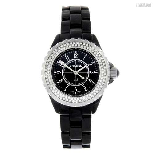 CHANEL - a lady's J12 bracelet watch. Black ceramic