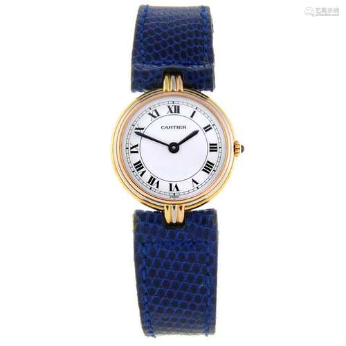 CARTIER - a Vendome Trinity wrist watch. Yellow metal