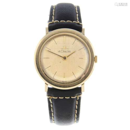 LECOULTRE - a gentleman's wrist watch. Yellow metal