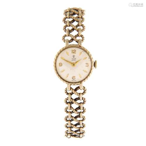 TUDOR - a lady's Royal bracelet watch. 9ct yellow gold