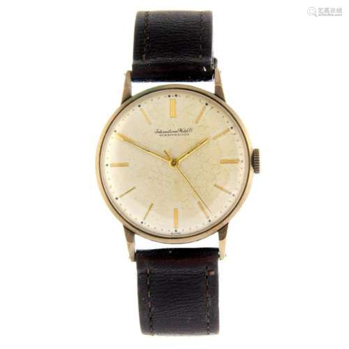IWC - a gentleman's wrist watch. 9ct yellow gold case,