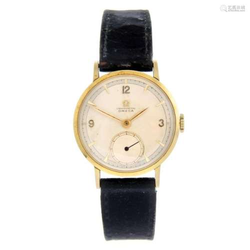 OMEGA - a gentleman's wrist watch. Yellow metal case,
