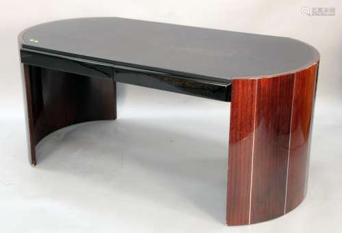 Contemporary modern desk, having shaped leather top
