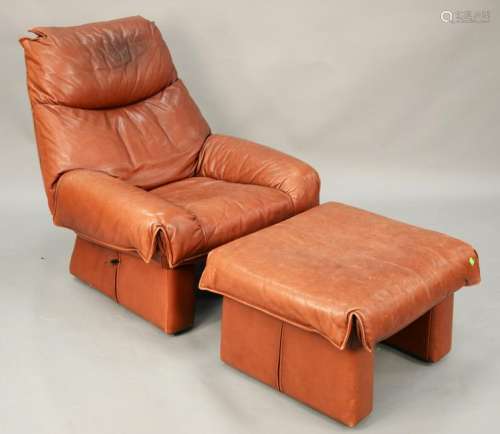 Modern maroon and leather club chair to include
