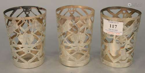 Set of twelve sterling silver glass holders, ht. 4 in.,