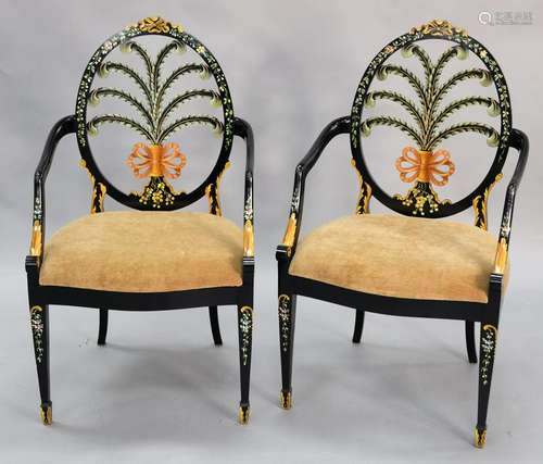 Pair of wheel back paint decorated arm chairs with