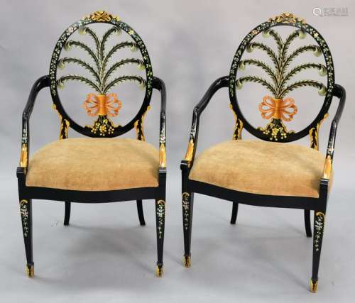 Pair of wheel back paint decorated arm chairs with