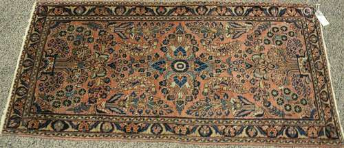 Three Oriental rugs to include an Oriental runner and