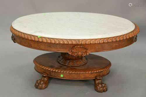 Oval Victorian marble top coffee table. ht. 20 in.,