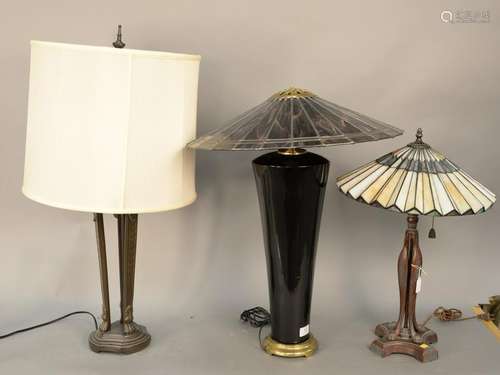 Three table lamps with leaded glass shades along with a