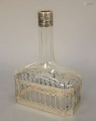 Etched crystal bottle with continental top and base.