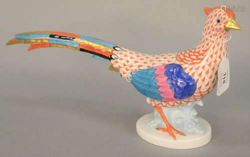 Herend porcelain pheasant in orange fishnet. Ht. 6 1/4