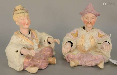 porcelain male and female nodder figures, polychrome