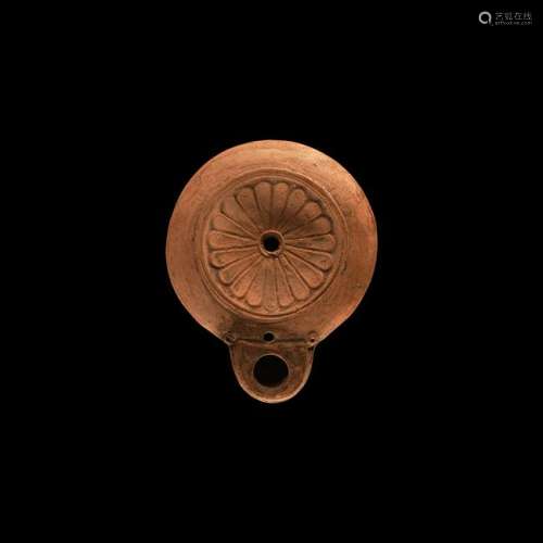 Roman Oil Lamp with Floral Motif