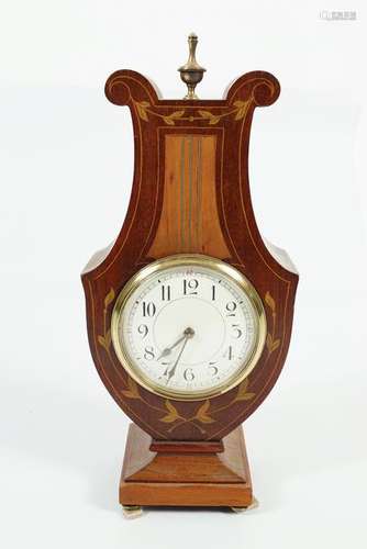 EDWARDIAN MAHOGANY AND SATINWOOD MANTLE CLOCK