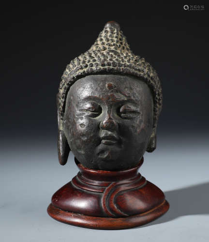 A Chinese Carved Bronze Buddha's Head