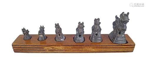 SET OF 6 CHINESE BRONZE GRADUATED SCROLL WEIGHTS