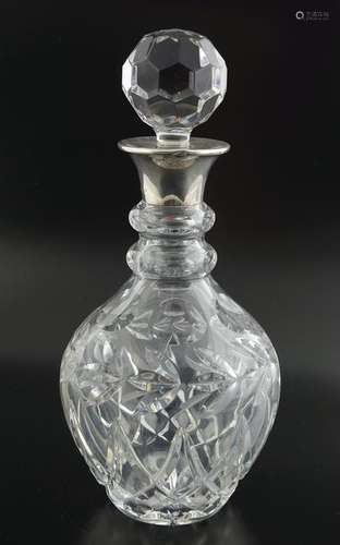 HEAVY CRYSTAL AND SILVER MOUNTED DECANTER