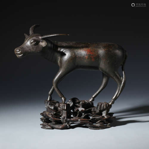 A Finley Cast Chinese Bronze Cow and Matching Zitan Stand