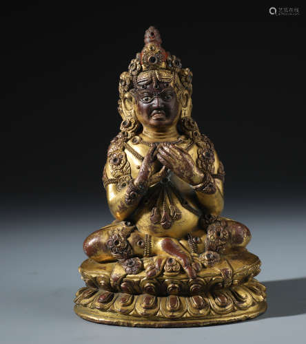 A Rare Chinese Gilt Bronze Figure of Master