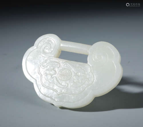 A Finley Carved Chinese White Jade Ruyi Shaped Pendent