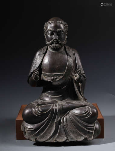 A Chinese Carved Bronze Figure of Luohan