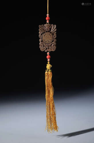 A Fine Chinese Carved Aloeswood 'Fu Shou' Pendent