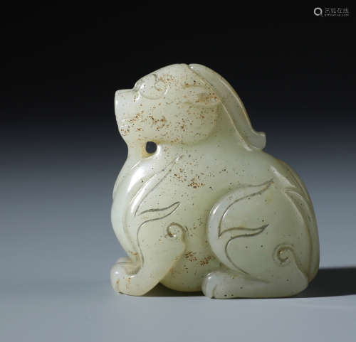 A Fine Chinese Carved  White Jade Recling Beast