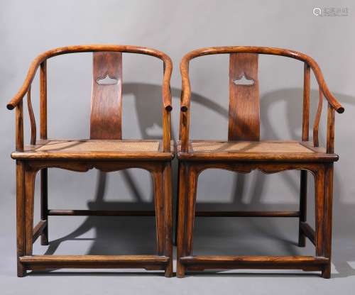 AN EXTREMELY RARE AND IMPORTANT PAIR OF HUANGHUALI HORSESHOE-BACK ARMCHAIRS, QUANYI