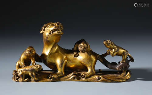 A Rare Chinese Carved Gilt Bronze Lion Brush Rest of Lion Group