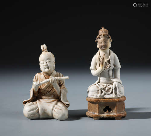 Two Chinese Moldeled  Porcelain Figures of Guanyin