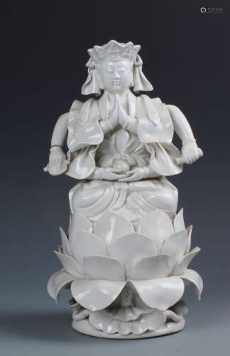 A Carved White Porcelain Figure of Buddha