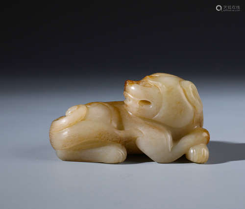 A Finely Carved Chinese  Russet Jade Lion