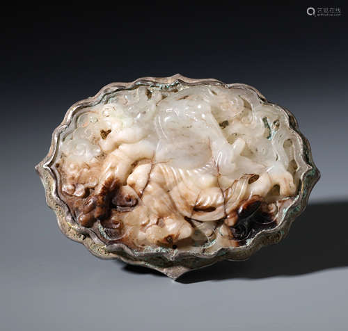 A Chinese Archaistic White and Russet Jade Mallow-shaped Buckle Plaque