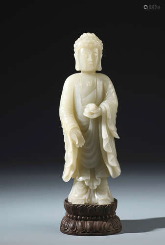 A Fine Chinese Carved Celadon Jade  Figure of Standing Sakyamuni