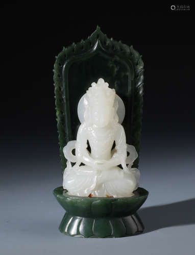 A Fine Chinese Carved White Jade Guanyin with Spinach Jade Stand