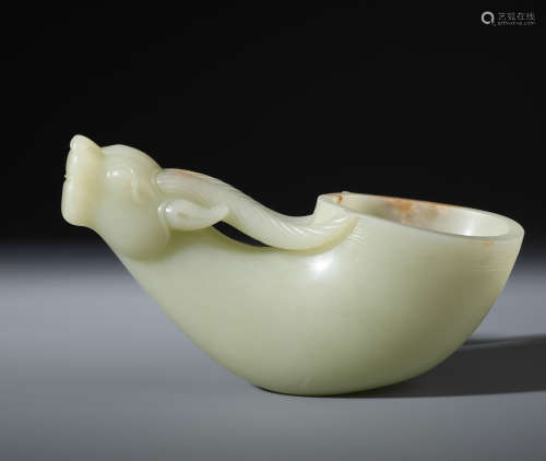 A Fine Chinese White and Russet Jade Goat Shaped Vessel