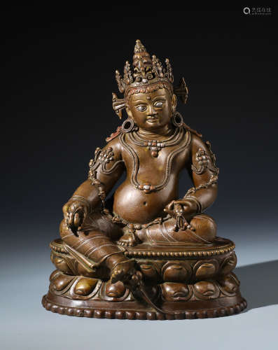 A Rare Chinese Carved Silver and Copper Inlaid Bronze Figure of  Jambhala