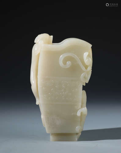 An Imperial Chinese Carved White Jade Archaistic Rhyton