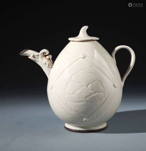 A Fine Chinese Carved Dingyao Ewer with Silver Spout